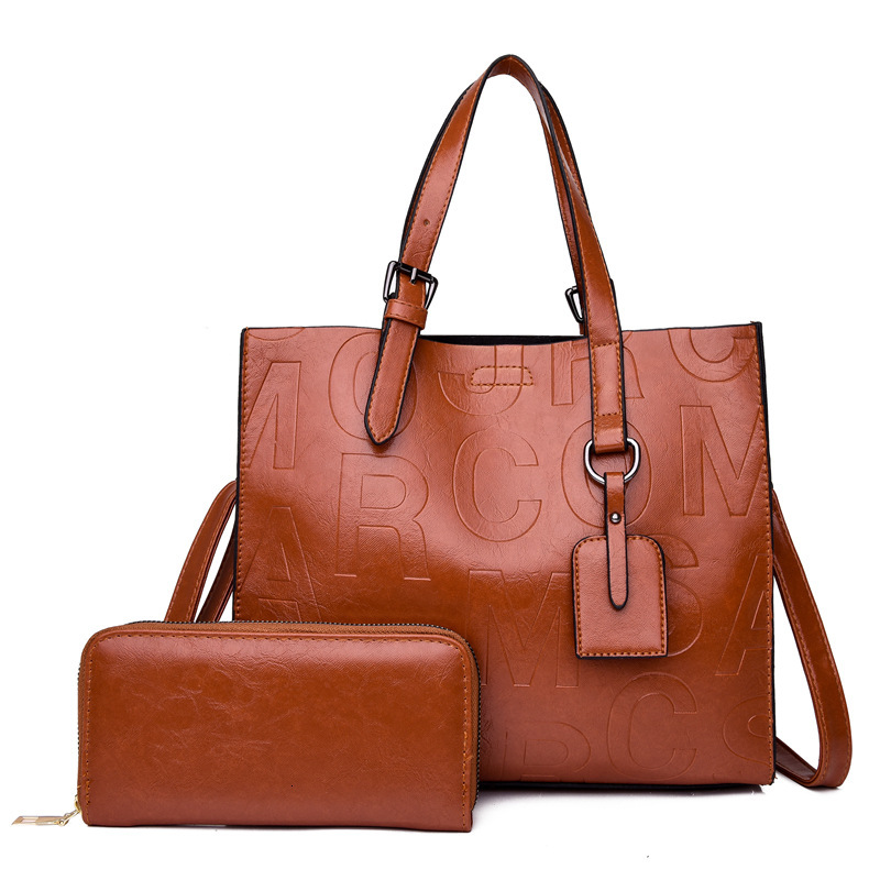 New designer women's new texture one handed cross shoulder nitrile mother bag set