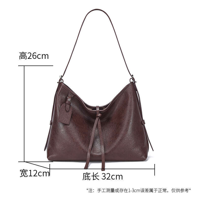 new Tote bag large capacity genuine leather 2024 autumnwinter new crossbody niche design single shoulder armpit women's bag
