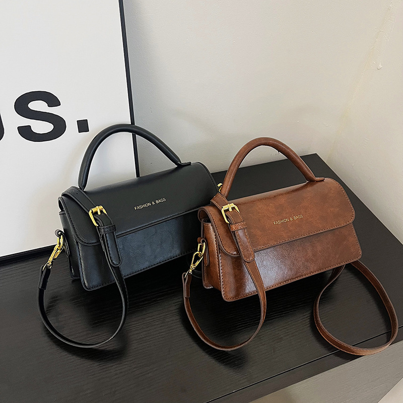 New designer's popular women's bag, niche high-end Western style new fashionable commuting single shoulder diagonal cross stick bag