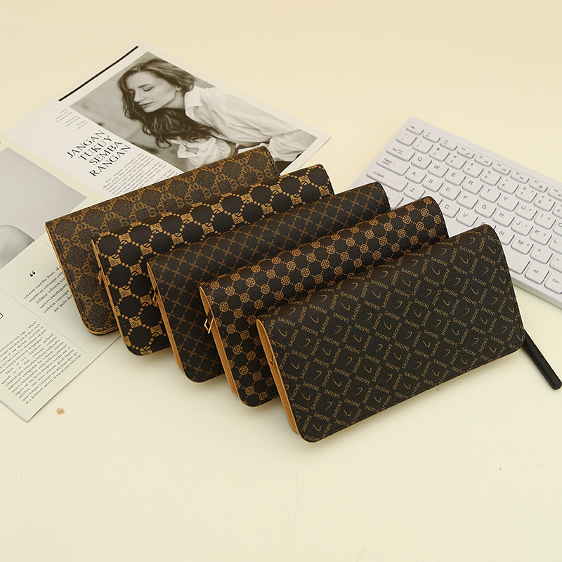 Women's Long, Large Capacity Zipper, Fashionable And Simple Handheld Wallet Wallet Designer's New Zero Wallet