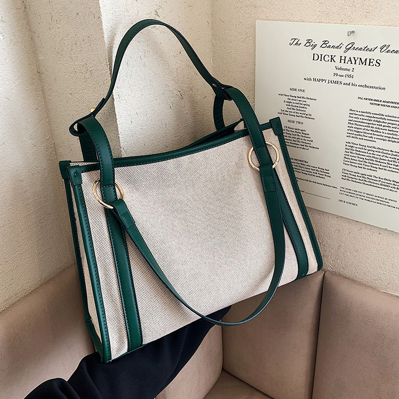 New designer women's large capacity casual shoulder armpit new canvas contrasting handbag fashion bag