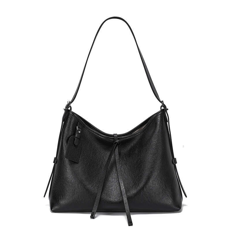 new Tote bag large capacity genuine leather 2024 autumnwinter new crossbody niche design single shoulder armpit women's bag