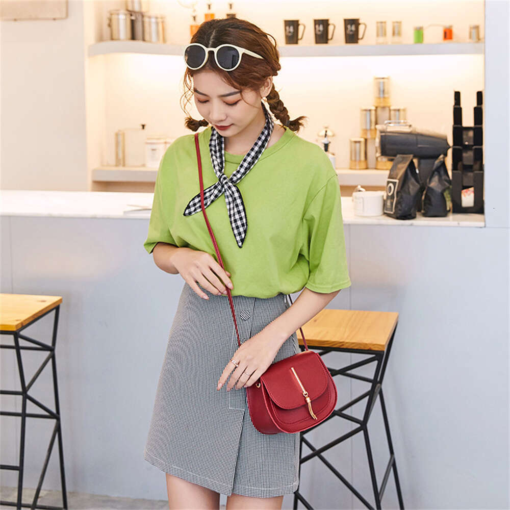 Designer Bag New Golden Tassel Double Layer Semi Circle Solid Color Shoulder Saddle Bag Fashion Casual Women Small Square Bag Crossbody Mini Saddle ba