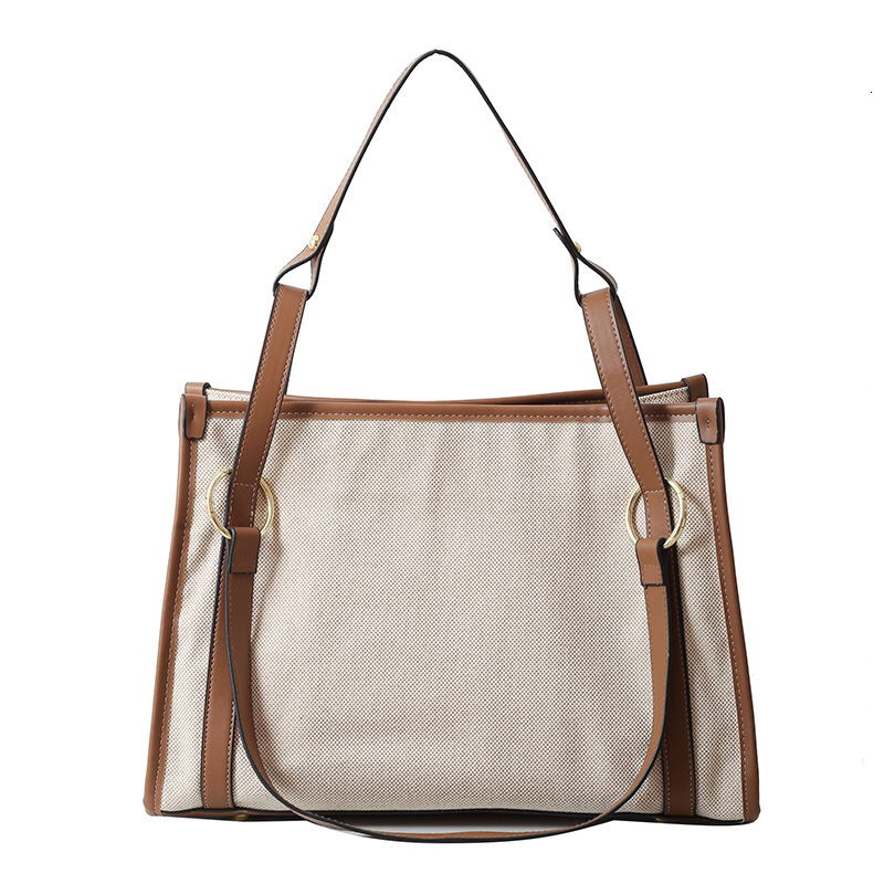 New designer women's large capacity casual shoulder armpit new canvas contrasting handbag fashion bag
