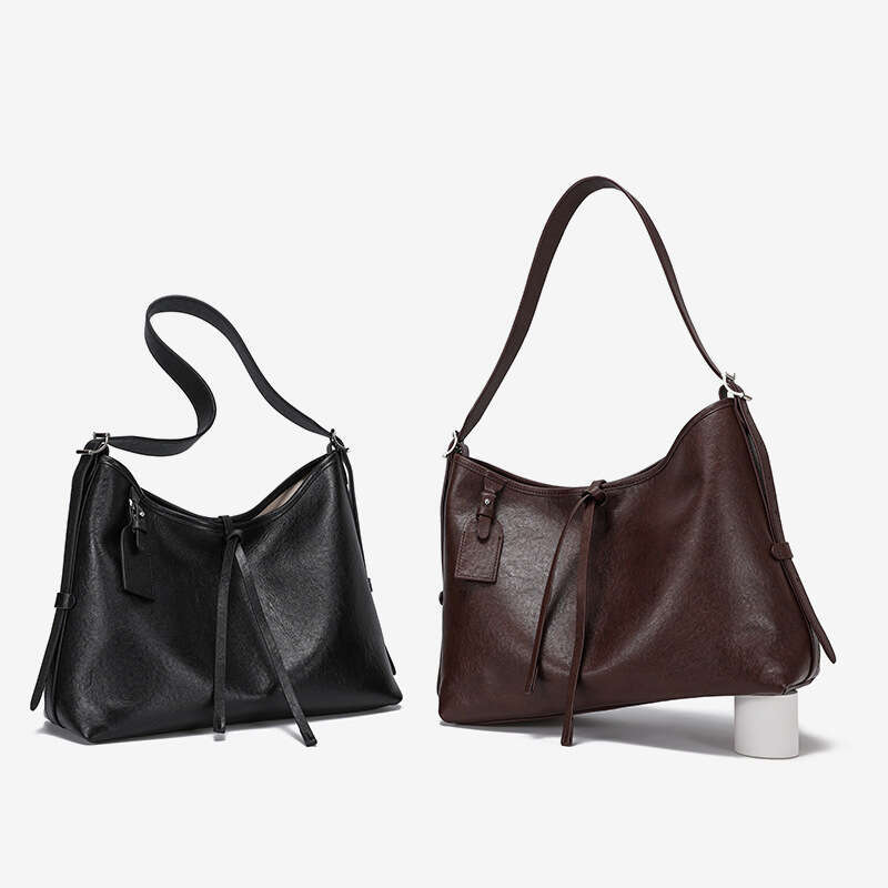 new Tote bag large capacity genuine leather 2024 autumnwinter new crossbody niche design single shoulder armpit women's bag