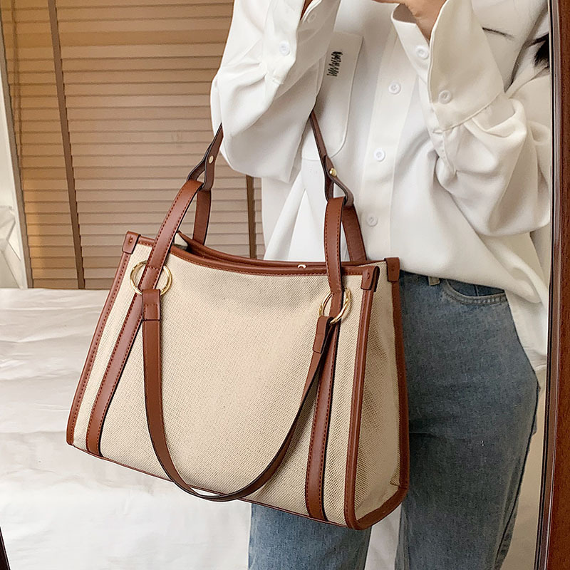 New designer women's large capacity casual shoulder armpit new canvas contrasting handbag fashion bag