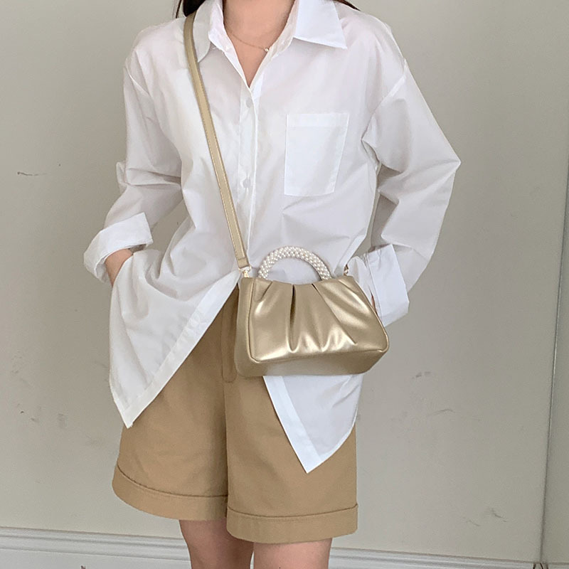 New designer's high-end French Bailing pearl handbag with a soft and sloping body, women's cloud bag, fashionable bag