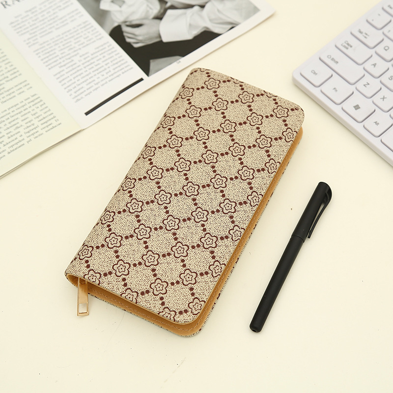 Women's Long, Large Capacity Zipper, Fashionable And Simple Handheld Wallet Wallet Designer's New Zero Wallet