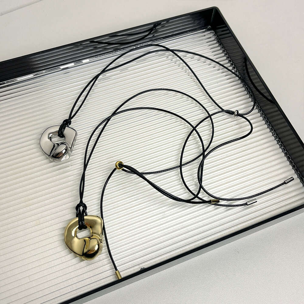 New Retro Irregular Hollow Pendant Necklace Design Adjustable Leather Rope Sweater Chain