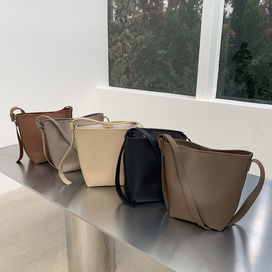 New designer Qiao Ge women's casual simple large capacity shoulder texture lychee pattern slanted new style