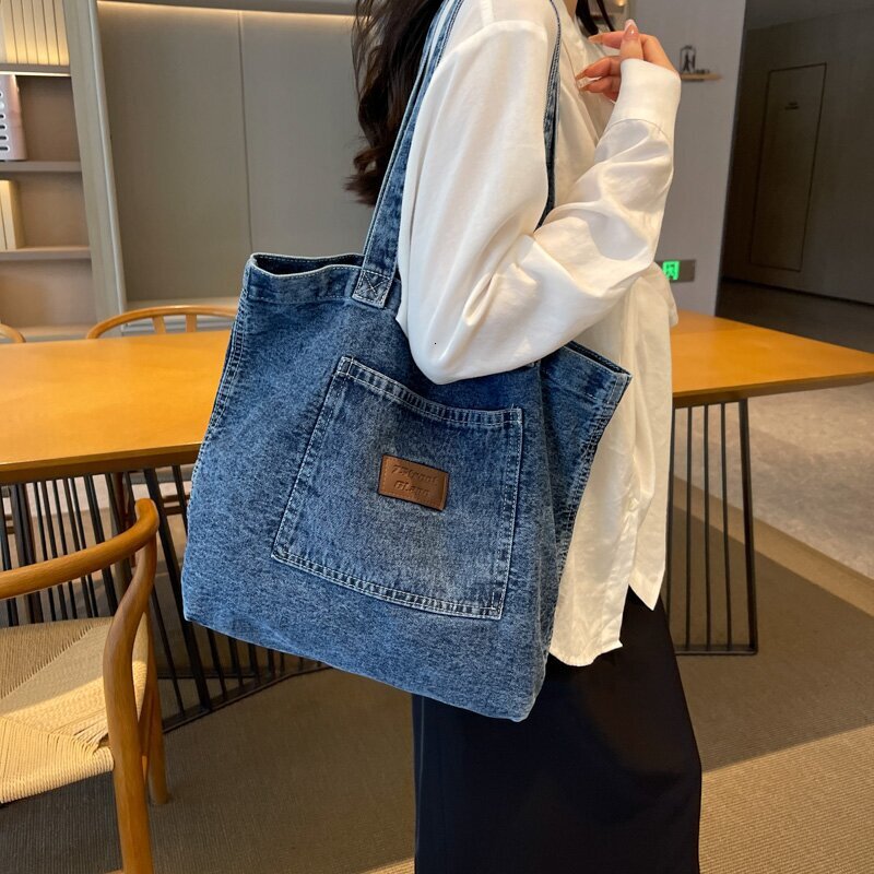 New designer denim canvas shoulder bag, new large capacity shopping, niche art handbag, casual handbag