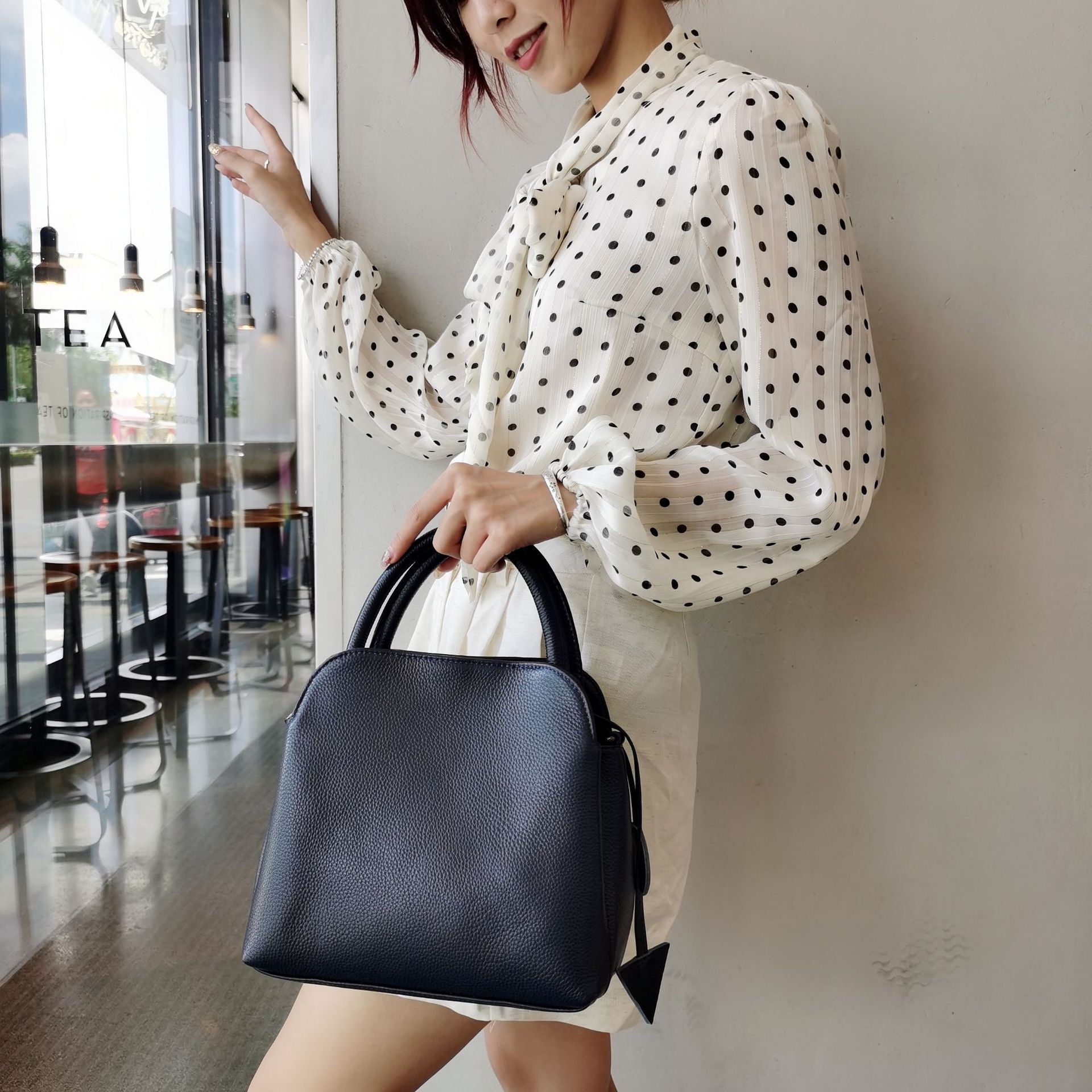 Designer's new top-level cowhide leather women's handheld crossbody bag fashion bag