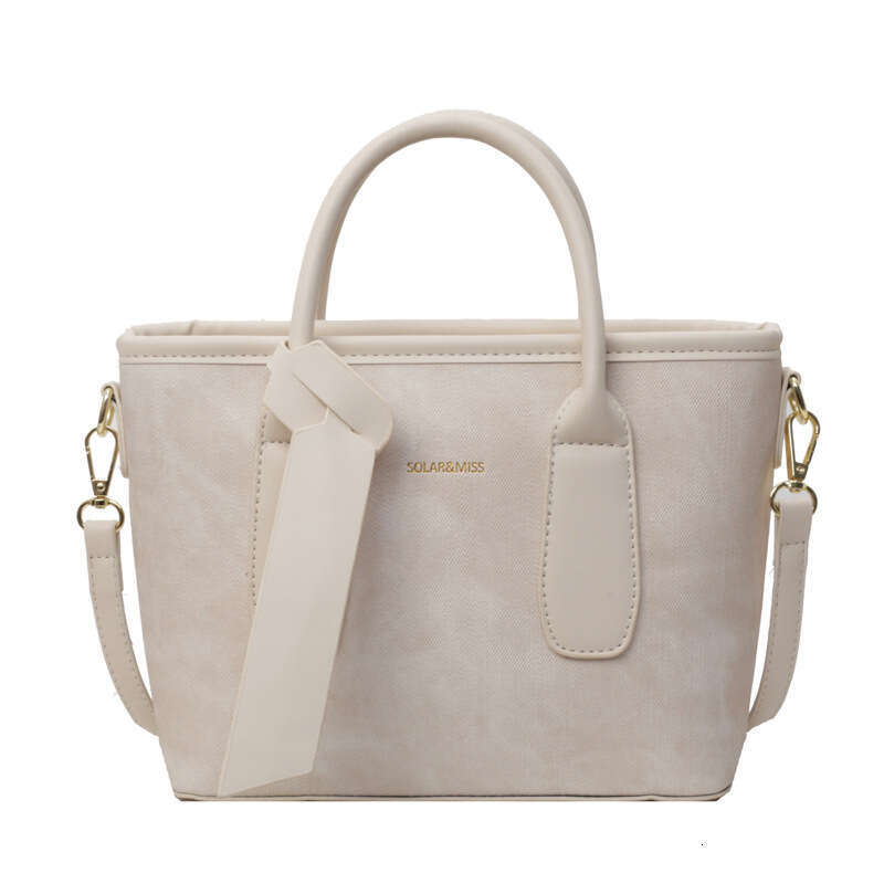 Crossbody women's new style fashionable single shoulder hand-held bucket bag, popular for work and commuting this year