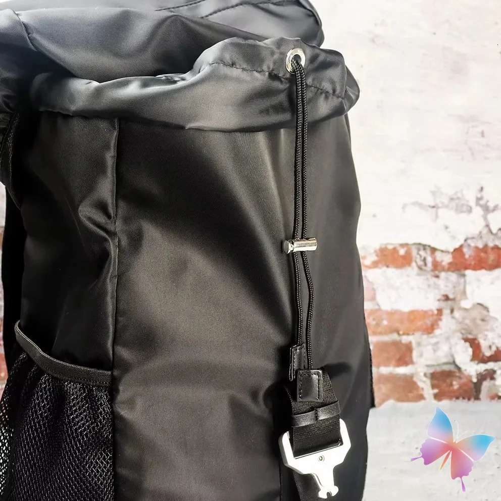 24ss 1017 ALYX 9SM Backpack Embroidered Letter Function Tactical Metal Sleeve Letter Outdoor Travel Nylon Flip Bag 241104