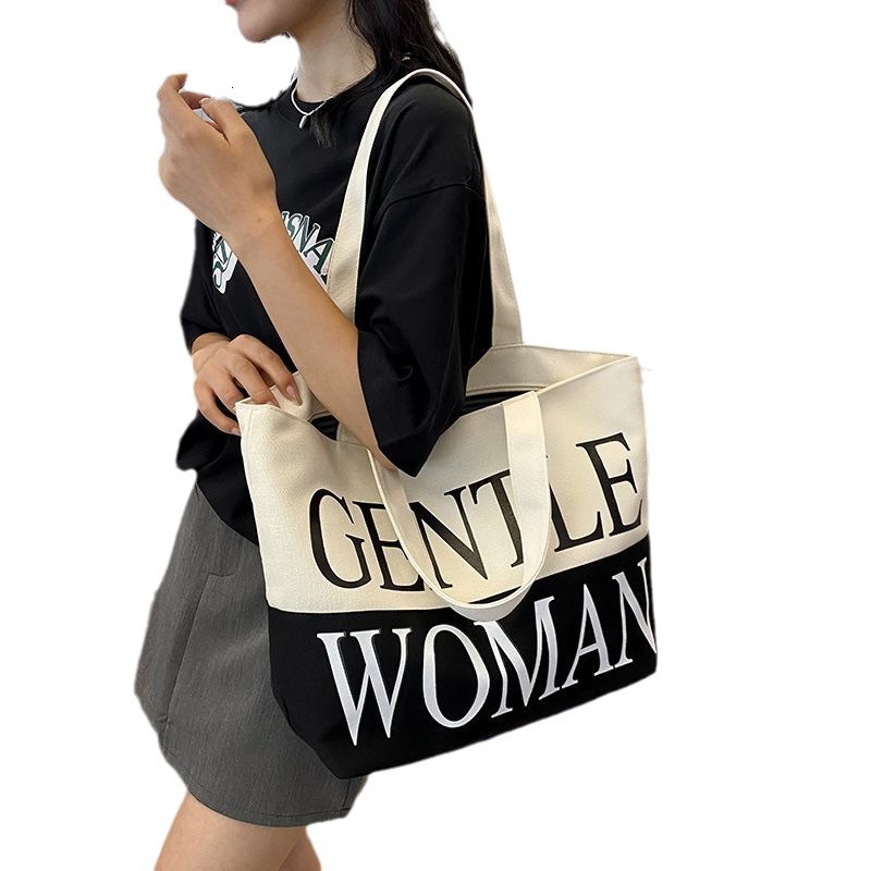 NEW New fashion designer minimalist letter canvas women s Korean casual multifunctional handheld armpit bag single shoulder handbag suitable trend for
