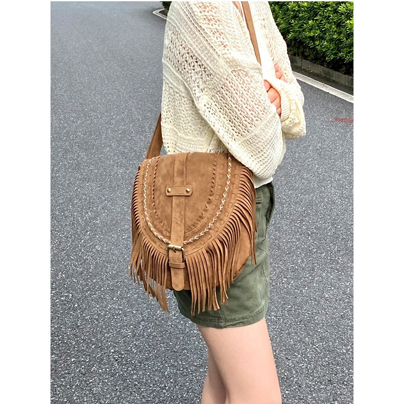 trend 2025NEW New designer tassel imitation suede saddle fashion trend versatile single shoulder diagonal fashion hanging women s bag fashion bag