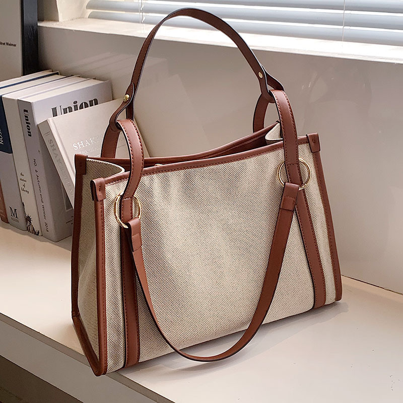 New designer women's large capacity casual shoulder armpit new canvas contrasting handbag fashion bag