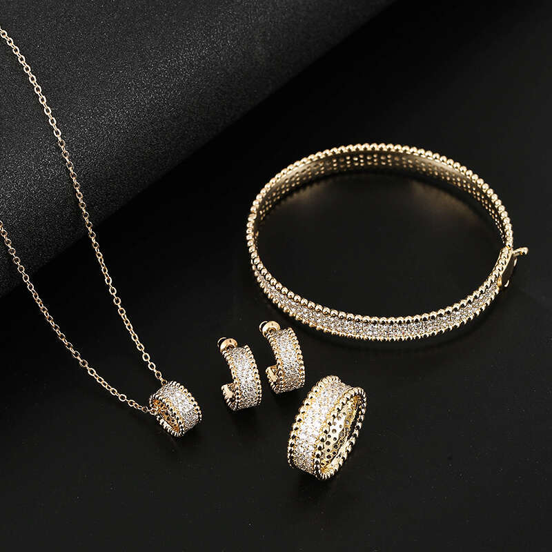 Women's Zircon Bracelet Ring Earring Pendant of Four High Quality Set Classic Plant wer Fashion Jewelry