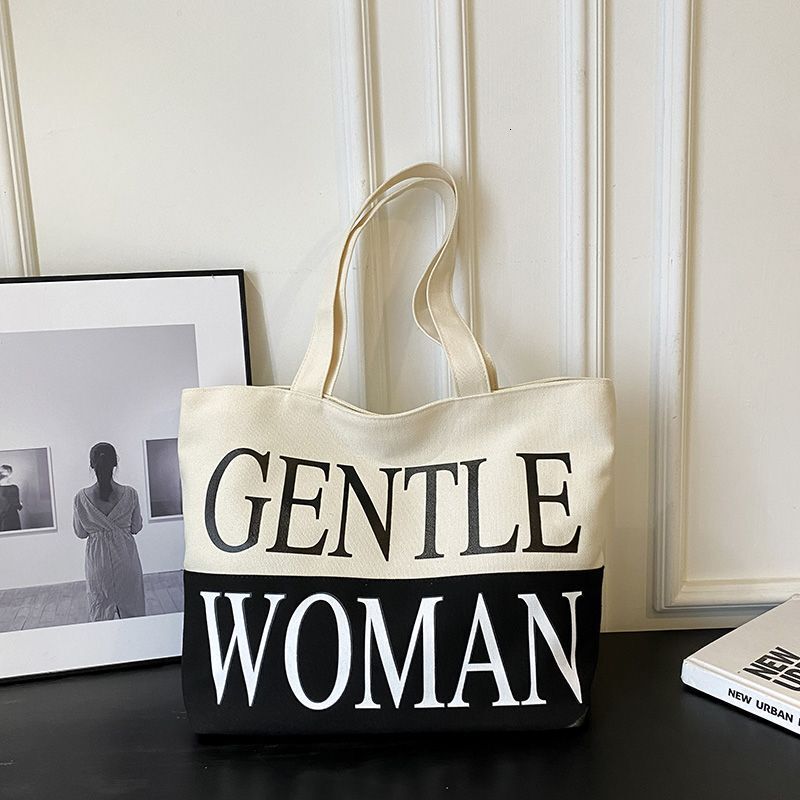 NEW New fashion designer minimalist letter canvas women s Korean casual multifunctional handheld armpit bag single shoulder handbag suitable trend for