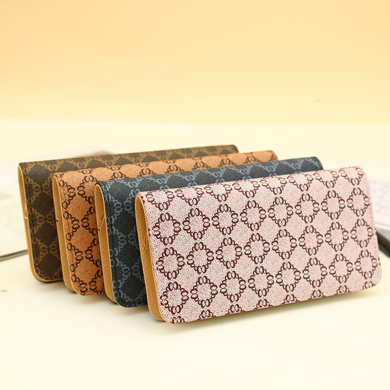 Women's Long, Large Capacity Zipper, Fashionable And Simple Handheld Wallet Wallet Designer's New Zero Wallet