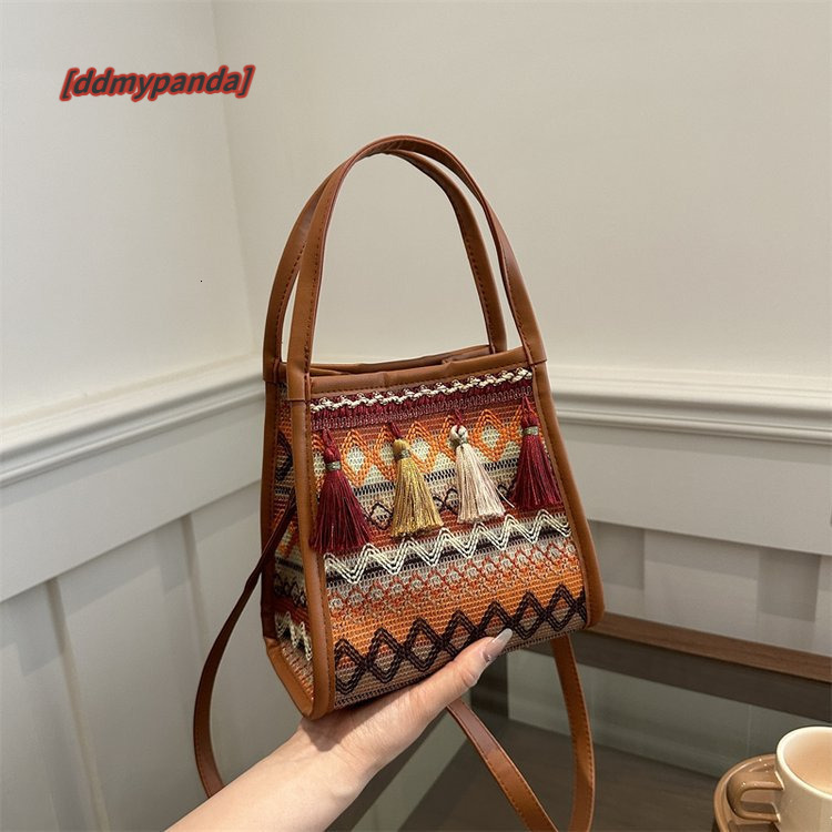 New ethnic style fashion women's handbag, trendy niche design, crossbody bag, tassel French stick bag #15 ddmypanda