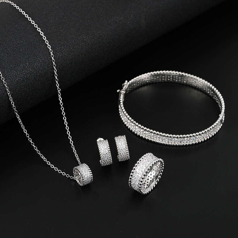 Women's Zircon Bracelet Ring Earring Pendant of Four High Quality Set Classic Plant wer Fashion Jewelry