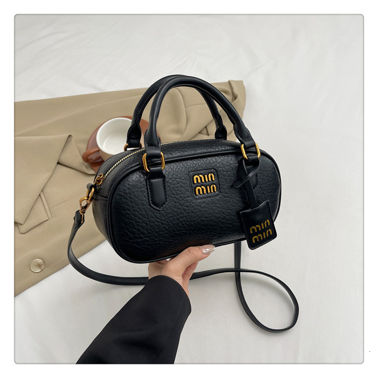 Designer's new women's handheld bowling high-end stone cross shoulder bag fashion bag