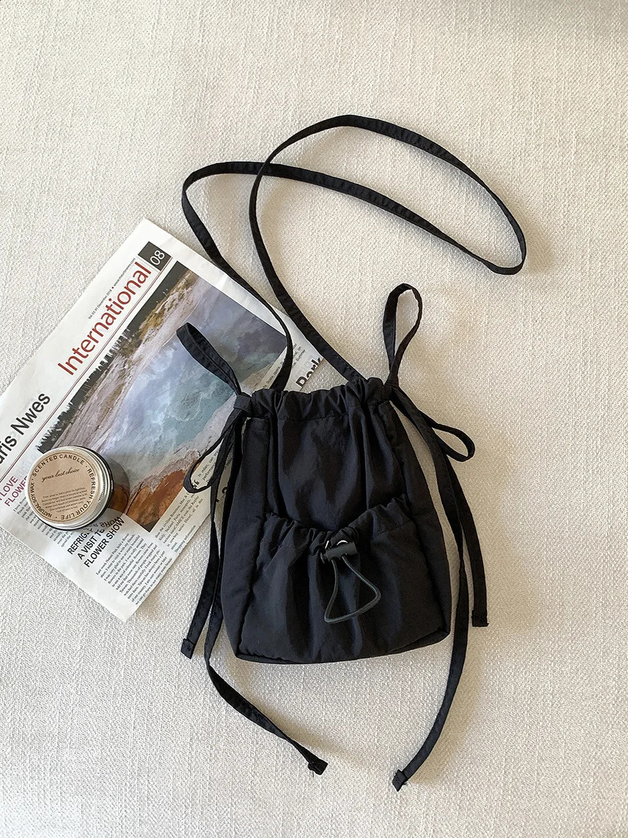 Wuxi womens drawstring small square bag nylon shoulder bag pleated niche cross body bag 241105