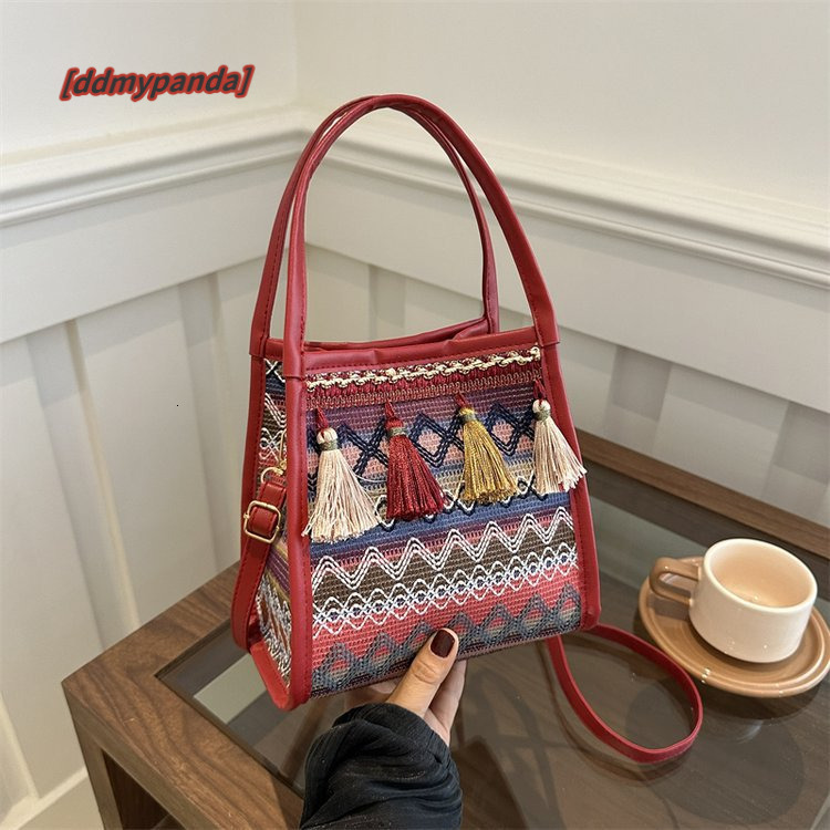 New ethnic style fashion women's handbag, trendy niche design, crossbody bag, tassel French stick bag #15 ddmypanda
