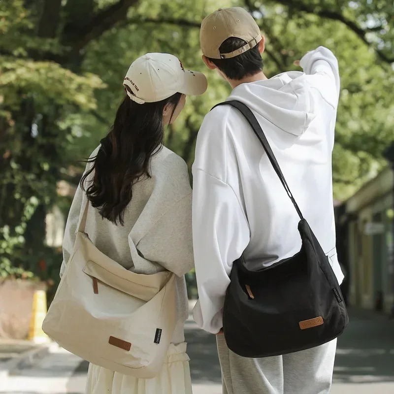 Womens shoulder cross body large canvas student messenger bag Japanese backpack womens handbag 241105