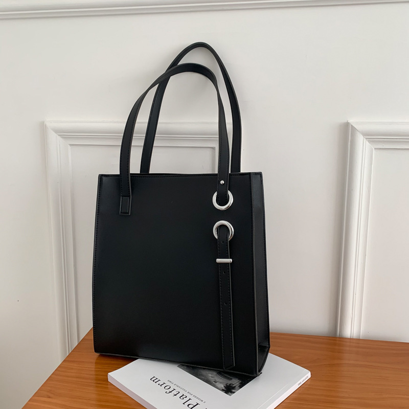 Designer's new large capacity bucket solid color shoulder bag Korean version shoulder bag women's fashion bag