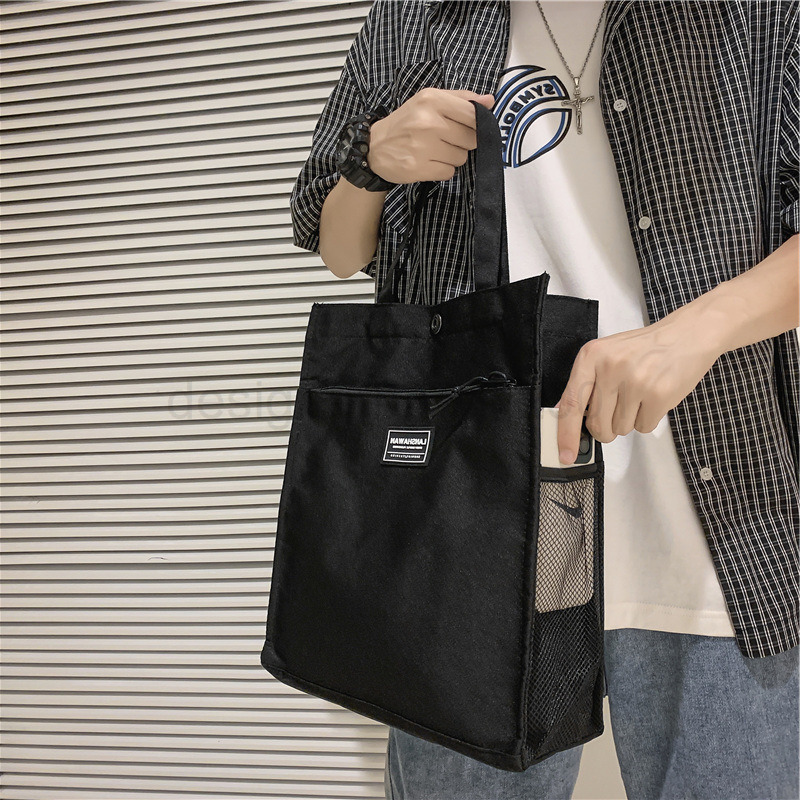 Classic Designer Bag Fashion 10a Top Nikiduncks Woman Mens Handbag Casual Simple Canvas Commuting Tote Shoulder Large Capacity File