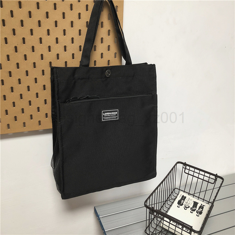 Classic Designer Bag Fashion 10a Top Nikiduncks Woman Mens Handbag Casual Simple Canvas Commuting Tote Shoulder Large Capacity File