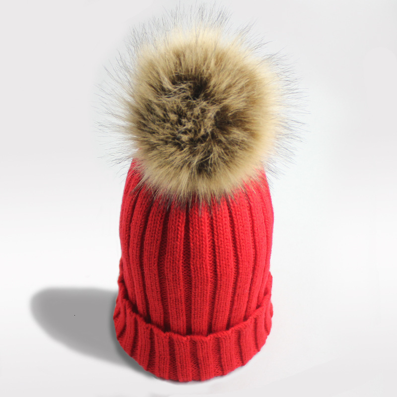 High quality design, men and women Autumn and Winter Pullover Solid Color Striped Outdoor Warmth Wool Ball Button Ear Protection Knitted Hat