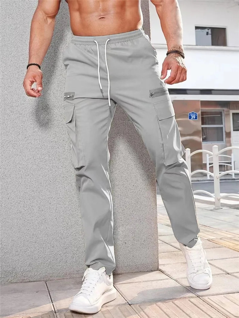 spring autumn Wearable men cargo Pants Drawstring sports Multi Pocket Mens sweatpants Quick drying solid color men trousers 241106
