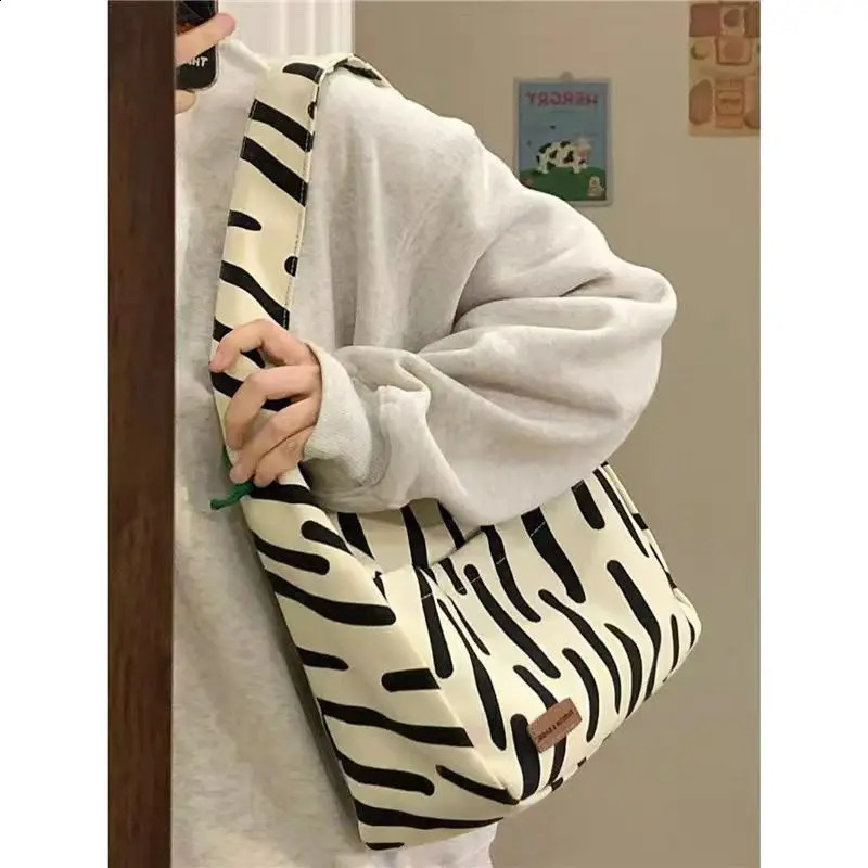 Small and high-end zebra patterned canvas womens large capacity handbag student grade shoulder bag womens handbag 241105