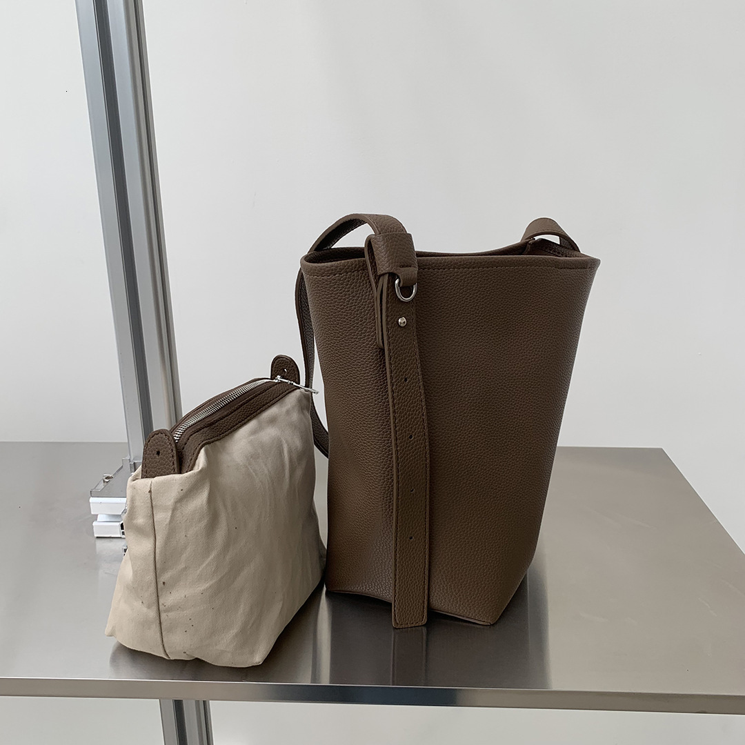 New designer Qiao Ge women's casual simple large capacity shoulder texture lychee pattern slanted body bag Autumn new fashionable bag