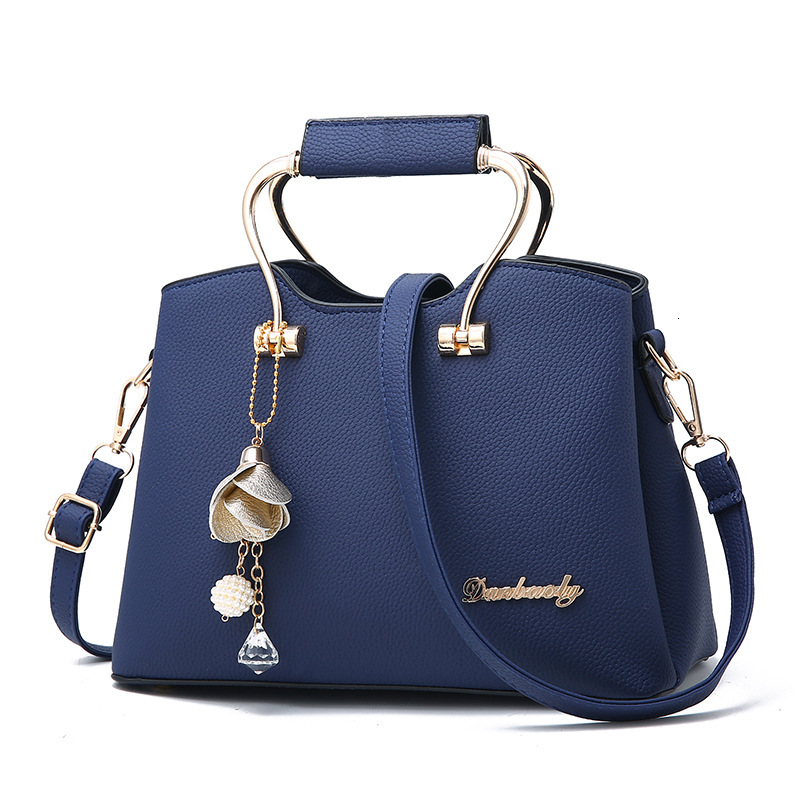 Designer's new atmosphere handheld women's large single shoulder multifunctional crossbody bag, fashionable and fashionable bag