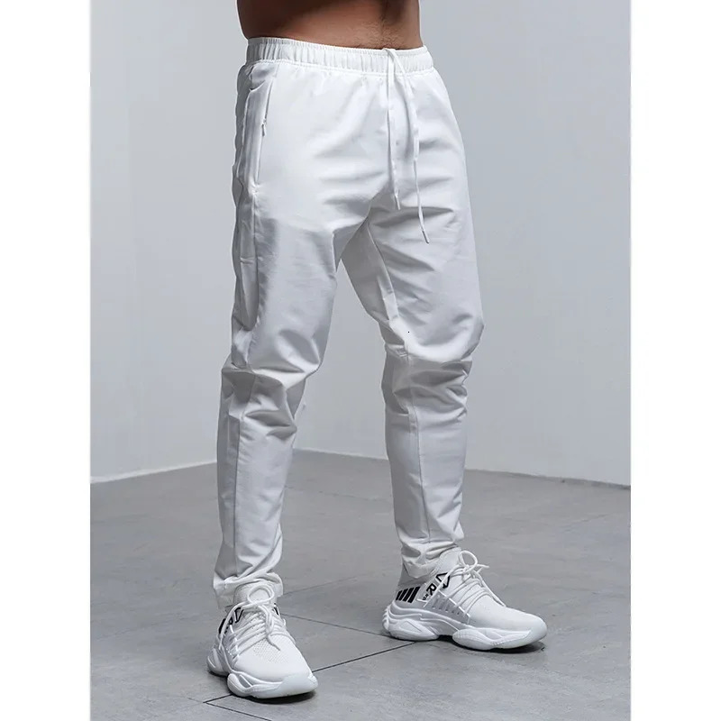 Breathable Loose Running Pants Men Autumn Winter Sport Training Gym Sportswear Elastic Waterproof Outdoor Zip Pocket Sweatpant 241104