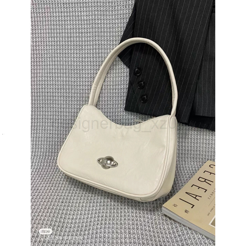 Bag Designer Fashion Classic 10a Top Nikiduncks Woman Handbagevening Bags Niche Soft Leather Planet Underarm 2024 New Trendy Versatile