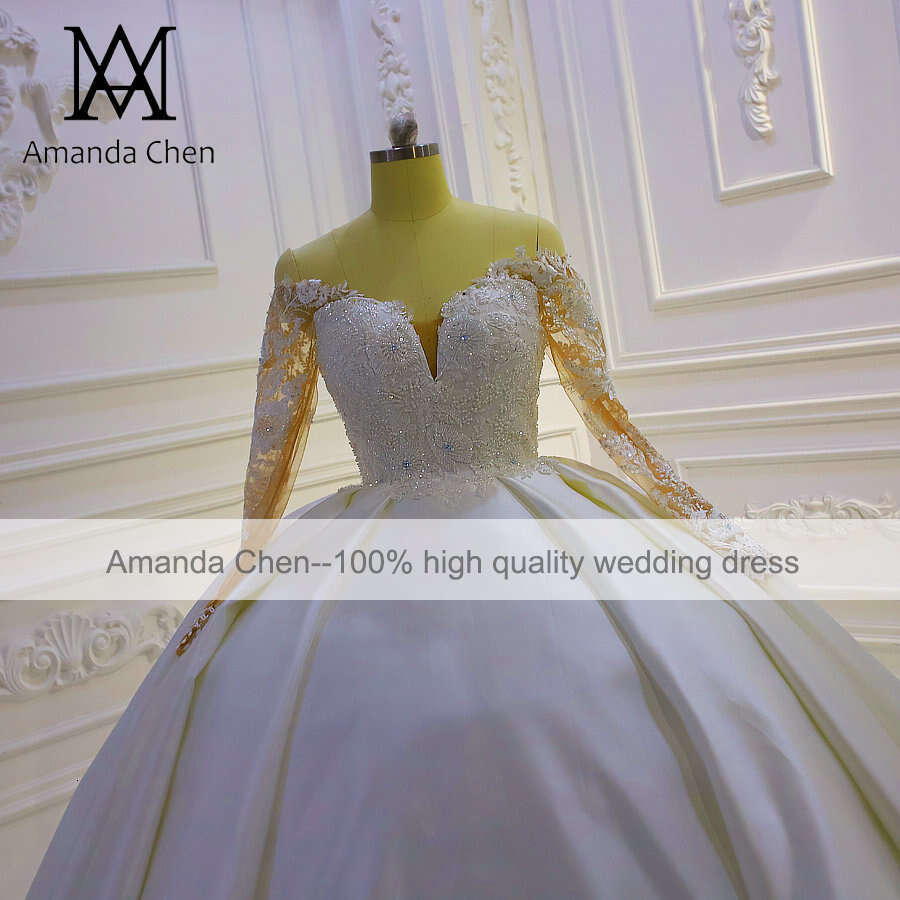 Off Shoulder Long Sleeve Ball Gown Tiered Skirts Wedding Dress