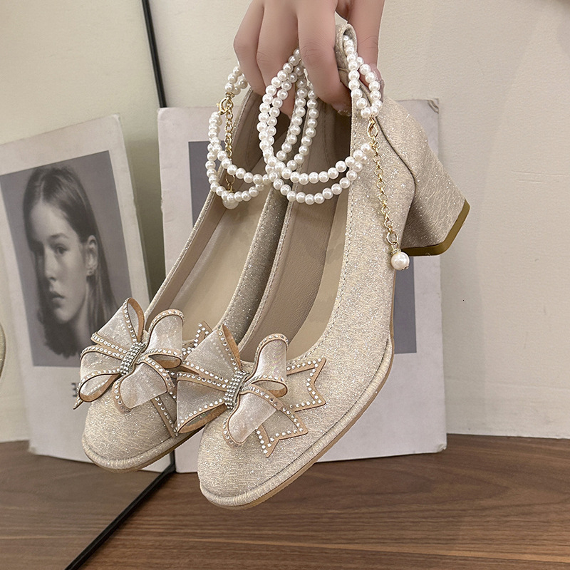 Elegant High-Heeled Footwear for Ladies Featuring a Beaded Bow Detail