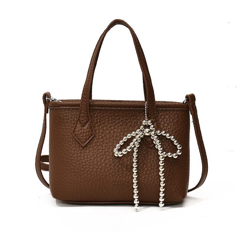 Bag Designer Fashion Classic 10a Top Nikiduncks Woman Handbagevening Bags New Fashionable and Versatile Style Butterfly Bow Bucket Sin