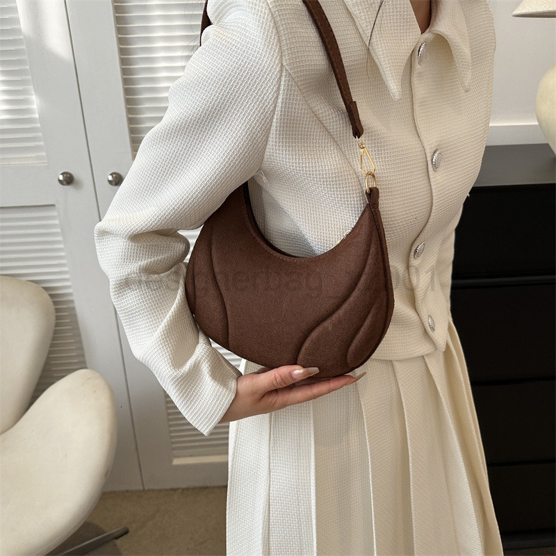 Fashion Classic Bag Designer 10a Top Nikiduncks Woman Handbagevening Bags 2024 Winter New Womens Half Moon Underarm Niche Design Highen