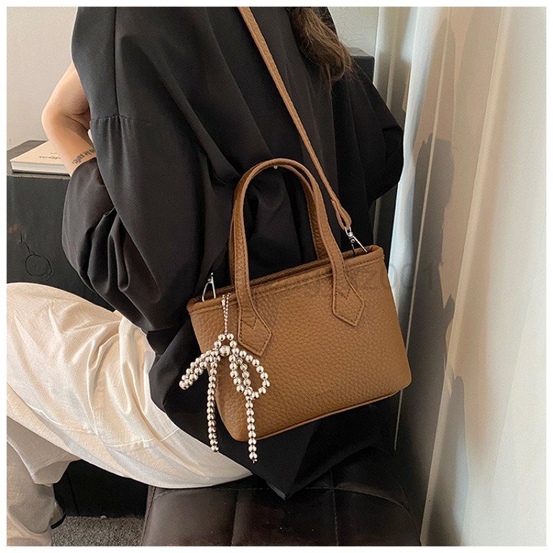 Bag Designer Fashion Classic 10a Top Nikiduncks Woman Handbagevening Bags New Fashionable and Versatile Style Butterfly Bow Bucket Sin