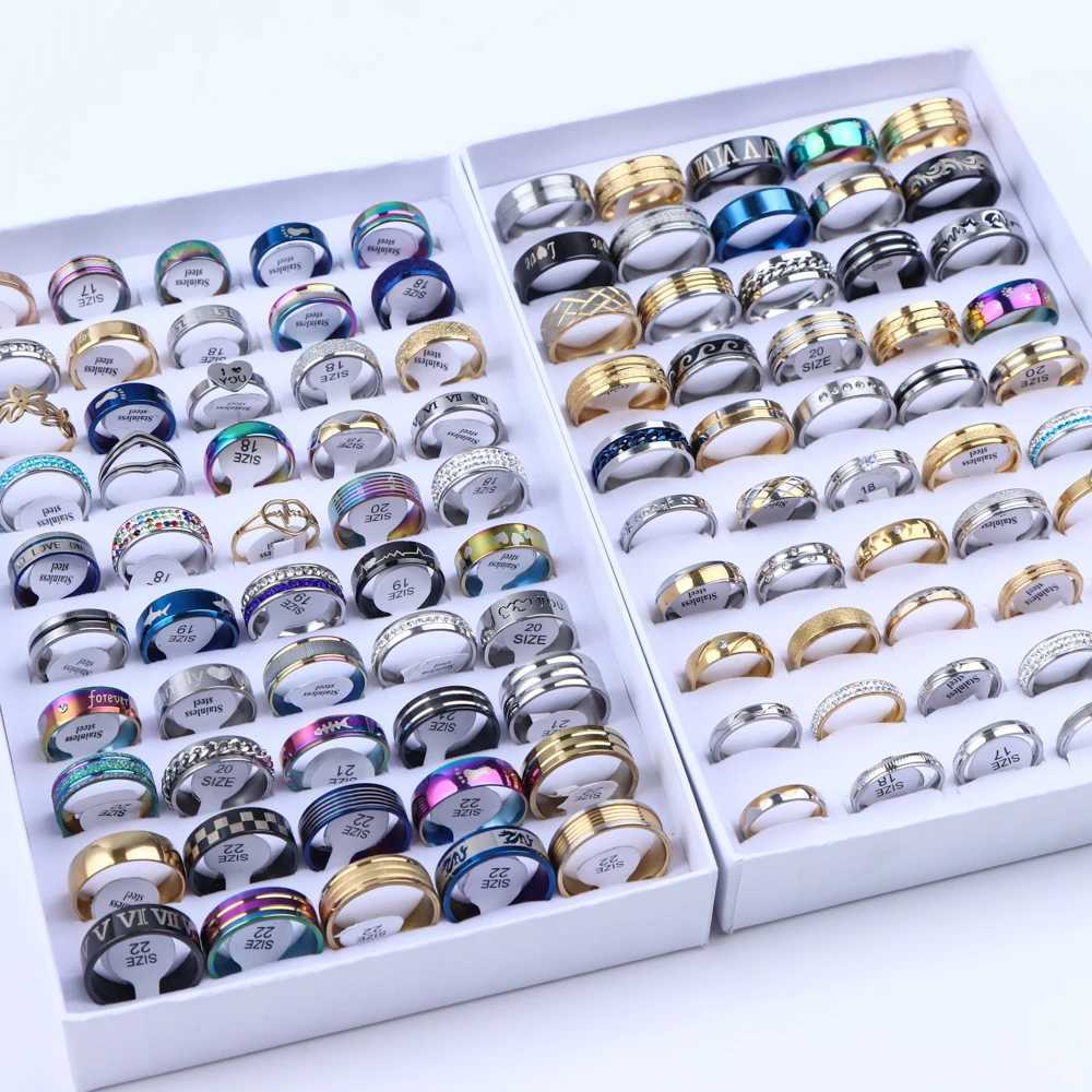 10 pieces/batch of fashionable classic striped stainless steel jewelry rings zircon crystal rotating punk pointed suitable for Wens mens gift mix styl