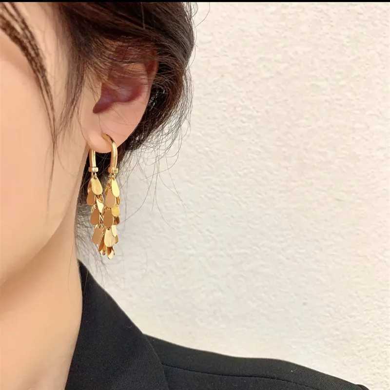 Retro solid color metal U-shaped tassel sequin earrings simple temperature drop shaped earrings unusual accessories for party girls X241106