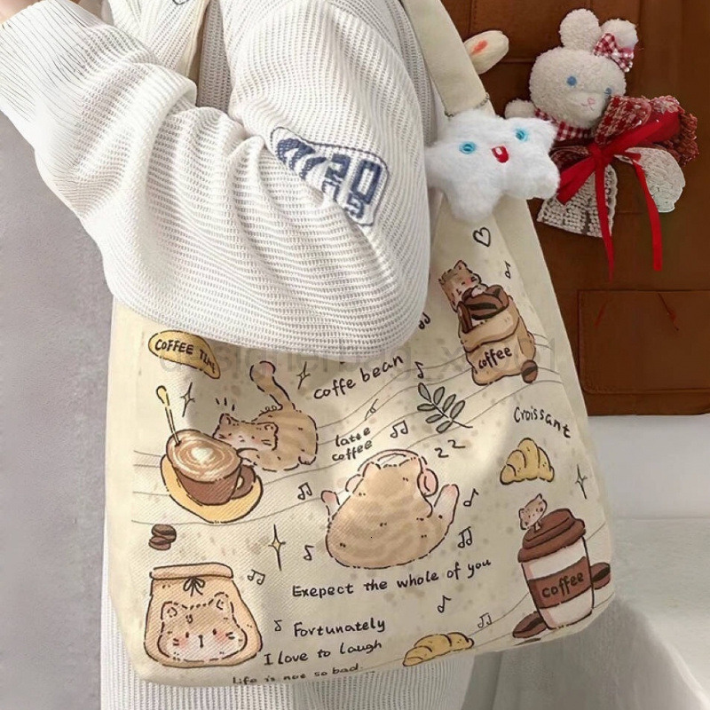 Fashion Classic Bag Designer 10a Top Nikiduncks Woman Handbagevening Bags 2024 New Kitten Shoulder Versatile Large Capacity Canvas Tot