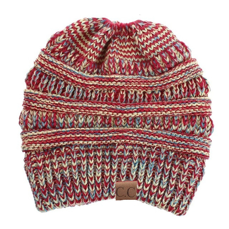 High quality design, men and women Autumn and winter knitted ear protection woolen ponytail hat