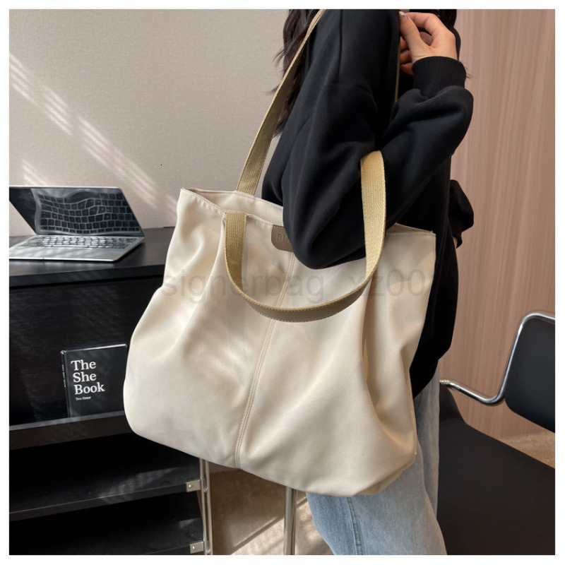 Classic Designer Bag Fashion 10a Top Nikiduncks Woman Handbagevening Bags Canvas Womens Large Capacity 2024 New Summer Versatile Singl